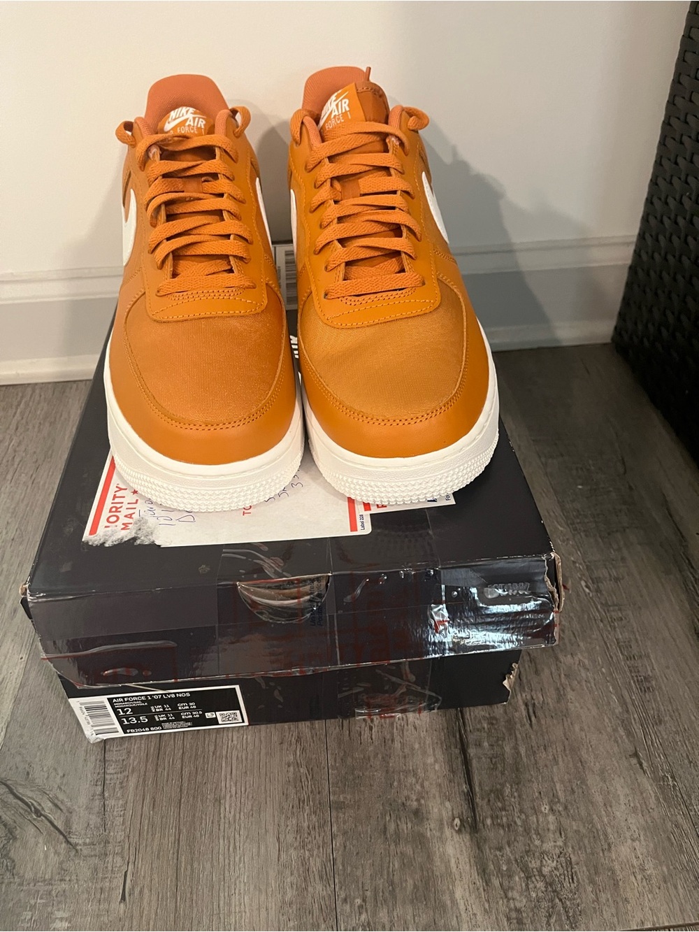 Nike Men's Low-Top Sneakers in Burnt Orange with White Swoosh